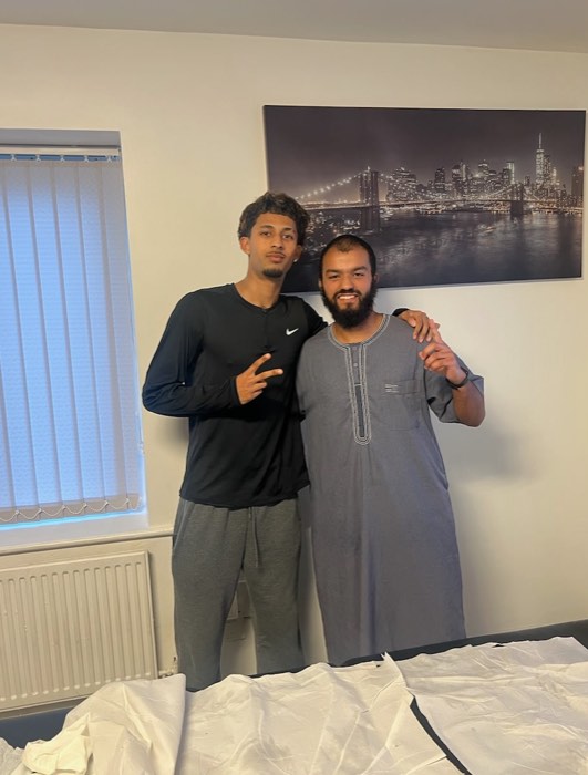 Ali with a professional padel player at the treatment table